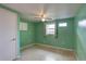 This bedroom has a window, ceiling fan and closet at 10703 59Th Ave, Seminole, FL 33772