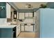 Functional kitchen with ample counter space, modern appliances, and stylish cabinetry at 10703 59Th Ave, Seminole, FL 33772