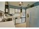 Functional kitchen with ample counter space, modern appliances, and stylish cabinetry at 10703 59Th Ave, Seminole, FL 33772