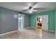 This room features neutral paint tones, natural light, and access to two more rooms at 10703 59Th Ave, Seminole, FL 33772