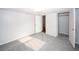 The bedroom includes neutral walls, carpet and a large closet for storage at 10740 Oldham Rd, Port Richey, FL 34668