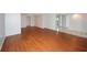 Open-concept living room with ample space and a view into the adjacent kitchen at 10740 Oldham Rd, Port Richey, FL 34668