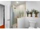 Modern bathroom featuring glass shower, elegant tilework, and stylish fixtures at 115 S Beverly Ave, Tampa, FL 33609
