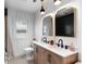 Beautiful bathroom with double vanity, stylish black and white tile, and modern fixtures at 115 S Beverly Ave, Tampa, FL 33609