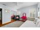 Charming bedroom with ample natural light, closet, vanity and cozy decor at 115 S Beverly Ave, Tampa, FL 33609