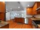 Kitchen features stainless steel appliances, granite countertops, and hardwood floors at 115 S Beverly Ave, Tampa, FL 33609