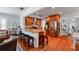 Open kitchen features stainless steel appliances, granite countertops, and breakfast bar seating at 115 S Beverly Ave, Tampa, FL 33609