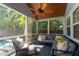 Inviting screened lanai with comfortable seating perfect for relaxing or entertaining at 115 S Beverly Ave, Tampa, FL 33609