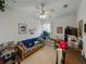 This bedroom is filled with an assortment of furniture with a ceiling fan to circulate fresh air at 11530 Arlhuna Way, Dade City, FL 33525