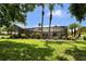 Screened patio with an outdoor kitchen and plenty of space for relaxing and entertaining at 12219 Steppingstone Blvd, Tampa, FL 33635