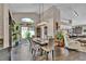 Open dining area with high ceilings and view of living room at 12219 Steppingstone Blvd, Tampa, FL 33635