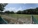 Spacious dog park enclosed by a fence, offering ample space for pets to play freely at 12219 Steppingstone Blvd, Tampa, FL 33635