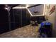 Enclosed patio boasts brick floors, fan, and outdoor kitchen at 12219 Steppingstone Blvd, Tampa, FL 33635