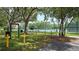 Well-maintained community tennis courts surrounded by trees and greenery, perfect for sports and recreation at 12219 Steppingstone Blvd, Tampa, FL 33635