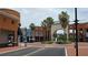 Charming town center featuring shops, restaurants, pedestrian walkways, and vibrant architecture at 12219 Steppingstone Blvd, Tampa, FL 33635