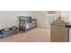 Neutral bedroom featuring a crib and changing table dresser at 12229 Coldstream Ln, Tampa, FL 33626