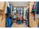 A spacious walk in closet featuring a lot of hanging racks, shelving, and dresser drawer storage at 12229 Coldstream Ln, Tampa, FL 33626
