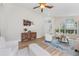 Bright living room with hardwood floors, vaulted ceiling, and stylish furniture at 12229 Coldstream Ln, Tampa, FL 33626