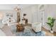 Bright living room with hardwood floors, vaulted ceiling, and stylish furniture at 12229 Coldstream Ln, Tampa, FL 33626