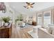 Bright living room with hardwood floors, vaulted ceiling, and stylish furniture at 12229 Coldstream Ln, Tampa, FL 33626
