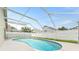 Private, screened-in pool with ample sunshine and a safety fence at 12229 Coldstream Ln, Tampa, FL 33626