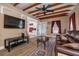Inviting living room with wood floors and beamed ceiling, perfect for relaxing or entertaining at 1235 Bass Blvd, Dunedin, FL 34698