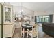 Dining room view showing the breakfast bar and easy access to the kitchen at 13127 Topflite Ct, Hudson, FL 34669