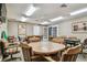 Clubhouse game room with a variety of table games and comfortable seating for residents at 13127 Topflite Ct, Hudson, FL 34669
