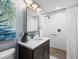 Bathroom featuring white tiled shower with a shower curtain at 132 Mirror Lake N Dr # 501, St Petersburg, FL 33701