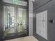 Building entrance with glass doors and mailboxes, ensuring secure access to the property at 132 Mirror Lake N Dr # 501, St Petersburg, FL 33701