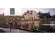 Scenic view of modern building reflected in Mirror Lake, seen from pedestrian walkway at 132 Mirror Lake N Dr # 501, St Petersburg, FL 33701