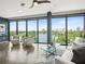 Bright living room with floor to ceiling windows showcasing a beautiful city and lake view at 132 Mirror Lake N Dr # 501, St Petersburg, FL 33701