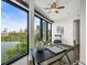 Bright office space with a large window providing stunning city views, complete with a desk and chair at 132 Mirror Lake N Dr # 501, St Petersburg, FL 33701