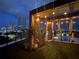 Beautiful rooftop deck with lounge seating and skyline views at 132 Mirror Lake N Dr # 501, St Petersburg, FL 33701