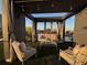 Charming rooftop patio with turf, lounge furniture, cafe lights and a view of the city at 132 Mirror Lake N Dr # 501, St Petersburg, FL 33701