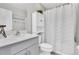 Bathroom features neutral colors, modern vanity, and shower/tub combination at 13306 Wildgrass Trl, Odessa, FL 33556