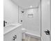 Modern bathroom featuring a shower with stylish tiling, a new toilet, and sink vanity at 13715 Maria Dr, Hudson, FL 34667