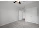 Spacious bedroom with carpet, ceiling fan and closet at 13919 Wineberry Dr, Dade City, FL 33525