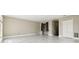 Spacious bedroom featuring a walk-in closet and marble tile floors at 1460 Kensington Woods Dr, Lutz, FL 33549