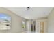 This bedroom has multiple windows providing lots of natural light and beautiful outdoor views at 1460 Kensington Woods Dr, Lutz, FL 33549