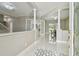 Bright foyer featuring marble floors, decorative inlay, and views to dining room and staircase at 1460 Kensington Woods Dr, Lutz, FL 33549