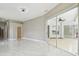 Spacious open-concept living area with modern lighting at 1460 Kensington Woods Dr, Lutz, FL 33549