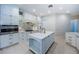 A clean kitchen design featuring stainless steel appliances and bright lighting at 147 Bay Point Ne Dr, St Petersburg, FL 33704