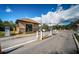A guard house at a gated entrance provides security and controlled access to the residential community at 1528 Riverdale Dr, Oldsmar, FL 34677