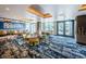 Stylish restaurant dining area with modern decor, comfortable seating, and views of the outdoor patio at 1528 Riverdale Dr, Oldsmar, FL 34677