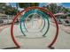 Colorful splash pad area with playful water features, perfect for Gathering fun in the sun at 1528 Riverdale Dr, Oldsmar, FL 34677