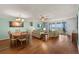 Inviting living room with water views, hardwood floors, and comfortable seating area at 1581 Gulf Blvd # 403N, Clearwater Beach, FL 33767