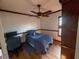 Bedroom featuring hardwood floors and a ceiling fan at 1716 Bondurant Way, Brandon, FL 33511