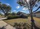 Inviting single-story home with lush landscaping and a convenient two-car garage at 1716 Bondurant Way, Brandon, FL 33511