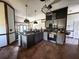 Bright kitchen featuring granite countertops and stainless steel appliances at 1716 Bondurant Way, Brandon, FL 33511